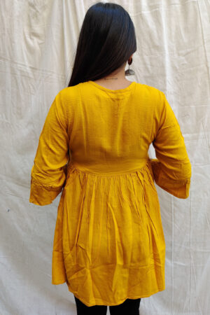 Yellow Short Kurti with Thread work and Tassels