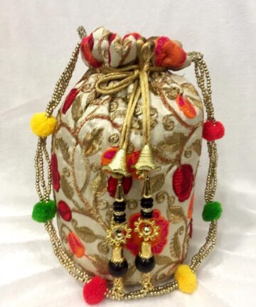 Hand work Potli bag with moti work and Tassles