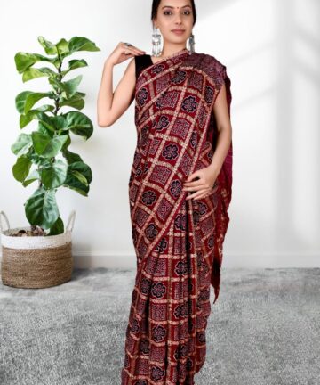 Handcrafted modal silk saree with traditional Ajrakh prints and Hand Weaving in vegetable dyes