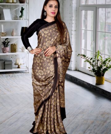 Handcrafted modal silk saree with traditional Ajrakh prints in vegetable dyes