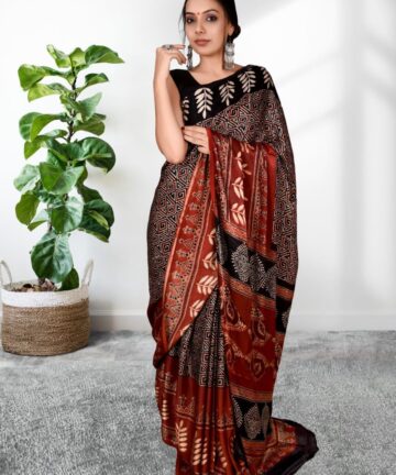 Handcrafted modal silk saree with traditional Ajrakh prints in vegetable dyes