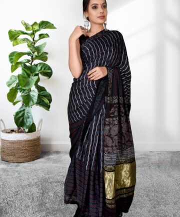 HANDCRAFTED MODAL SILK SAREE WITH TRADITIONAL AJRAKH PRINTS AND GOLDEN BORDER IN VEGETABLE DYES