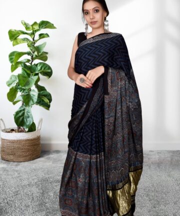 Handcrafted modal silk saree with traditional Ajrakh prints and Golden Border in vegetable dyes