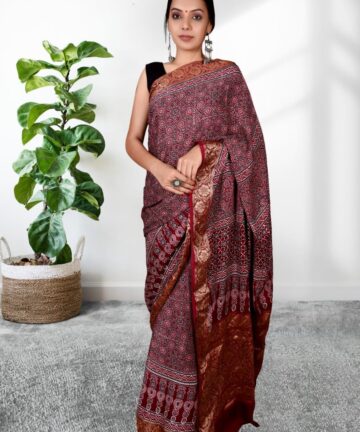 Handcrafted modal silk saree with traditional Ajrakh prints and Hand Weaving in vegetable dyes