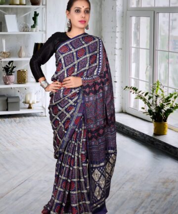 Handcrafted modal silk saree with traditional Ajrakh prints and Hand Weaving in vegetable dyes