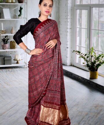 Handcrafted modal silk saree with traditional Ajrakh prints and Golden Border in vegetable dyes