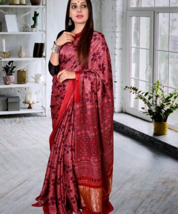 HANDCRAFTED MODAL SILK SAREE WITH TRADITIONAL AJRAKH PRINTS AND GOLDEN BORDER IN VEGETABLE DYES